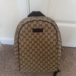 Gucci traveling backpack